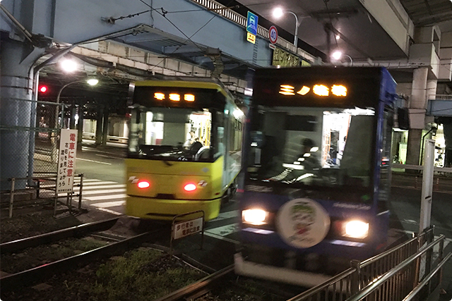 The trains across over the traffic light (Trams)